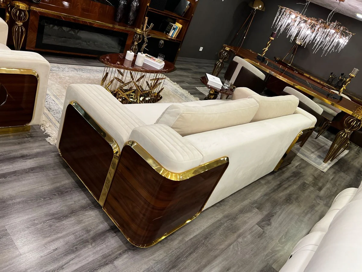Luxus Couchtisch Braun / Gold 120 x 51 x H. 47 cm - Ovaler Edelstahl Wohnzimmertisch mit Massivholz Tischplatte - Wohnzimmer Möbel - Hotel Möbel - Luxus Möbel