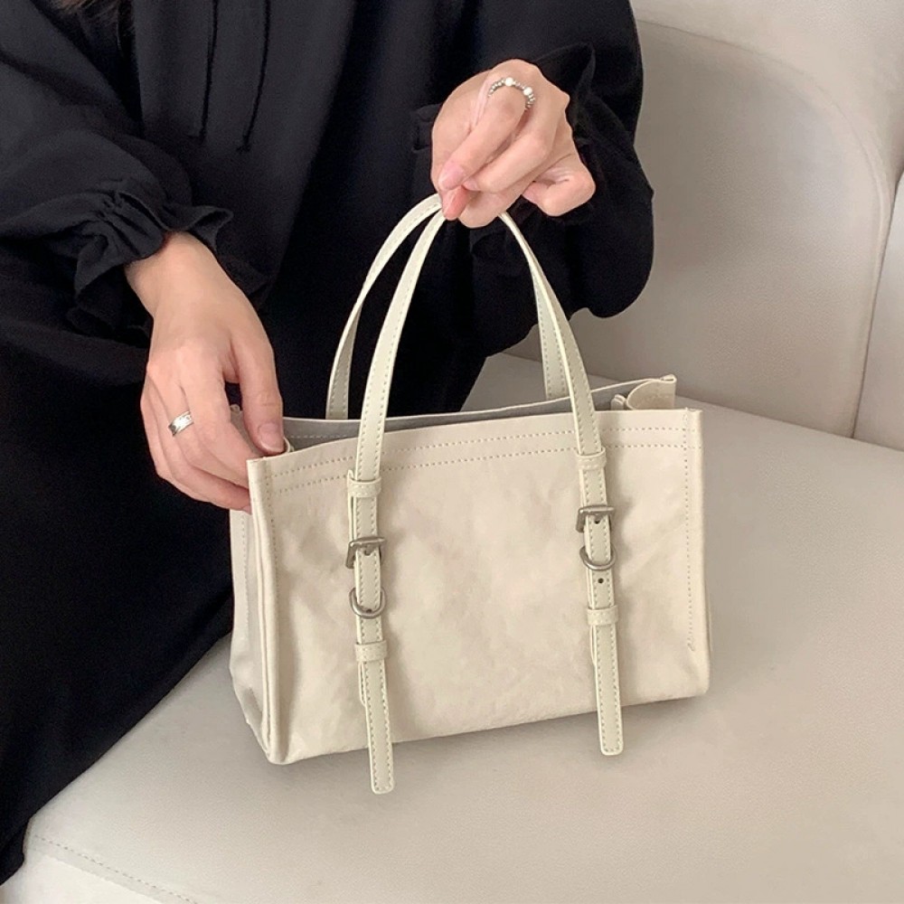 2025 new all-match commuter vegetable tanned cowhide hand-held tote bag women's bag